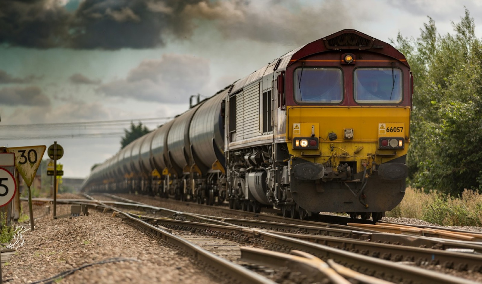 A freight train moving along a rail line